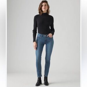 Levi’s 311 Shaping Skinny Jeans in a Mid Blue Wash